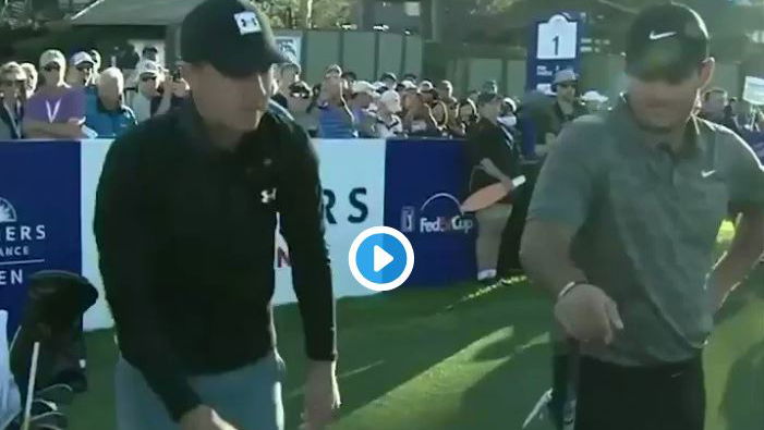 Spieth and Reed hug