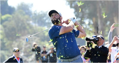 WATCH: Two golf fans FAKE injuries after Jon Rahm tee shot at Riviera