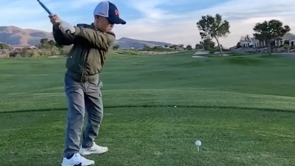 WATCH: How much would you pay to have this 8-year-old's golf swing?!
