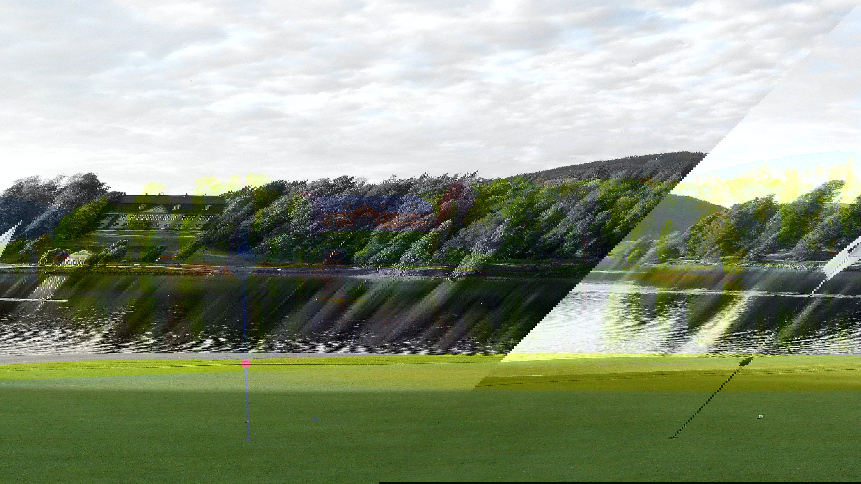 Why is golf shutdown in England but allowed to carry on in Scotland?