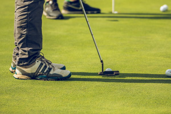 What is the penalty for hitting off a WRONG putting green?