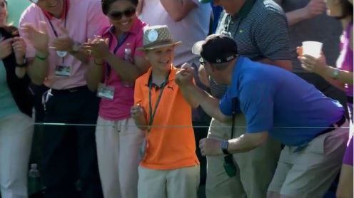 matt kuchar ace then signs ball for child