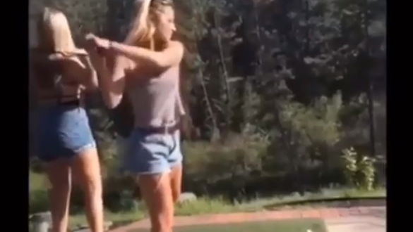 WATCH: Lady takes swing, misses ball and knocks out her best mate!