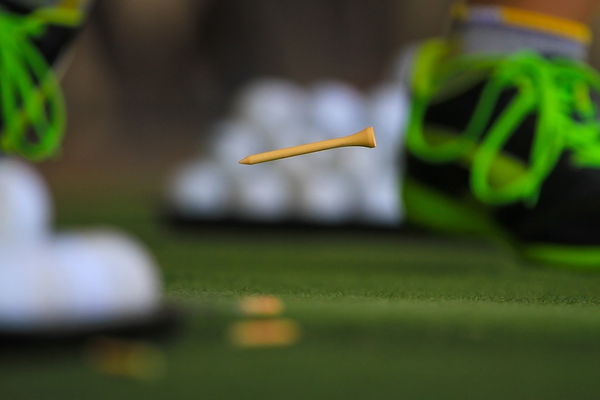 Golfer caught TEEING HIS BALL in the rough during competition