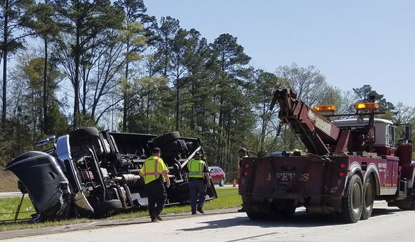 Masters bus crashes en route to Augusta, 17 injured, driver charged with DUI