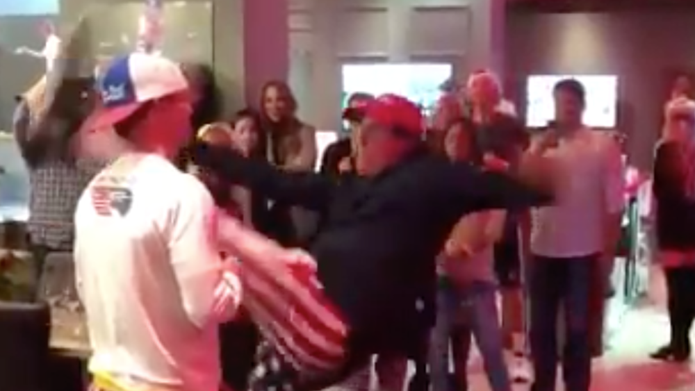 Phil Mickelson kicks water bottle off Zach Johnson's head