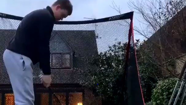 Video goes viral of golfer SMASHING WINDOW after golf net nightmare