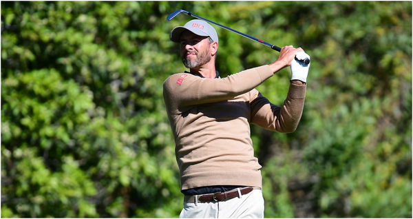 Adam Scott finds water twice, makes quad, then four-hour rain delay came