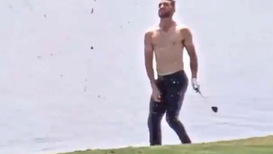 WATCH: Tour pro makes eagle two from the water without his shirt on!