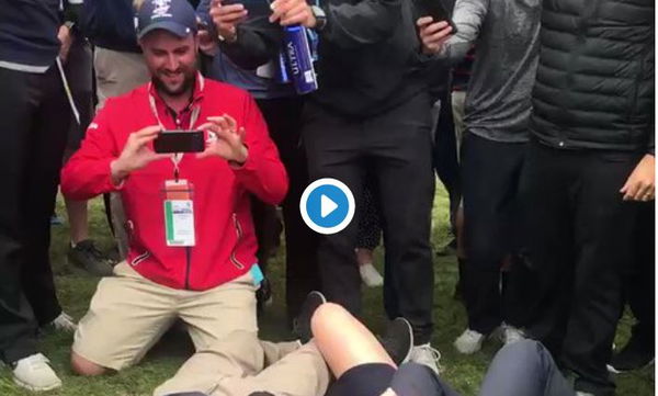 Henrik Stenson lays on the floor to take selfie with fan