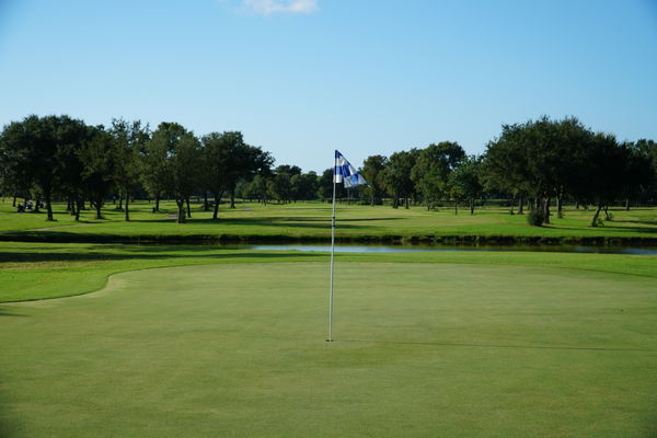 Do you have to place your marker behind the golf ball on the green?