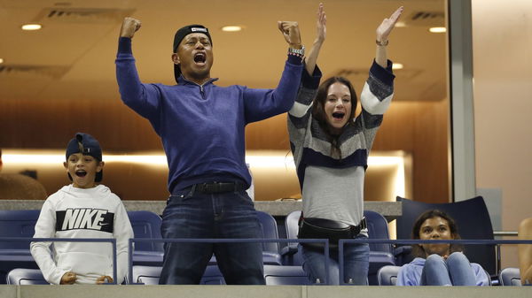 Tiger Woods celebrates Rafa Nadal with his iconic fist pump