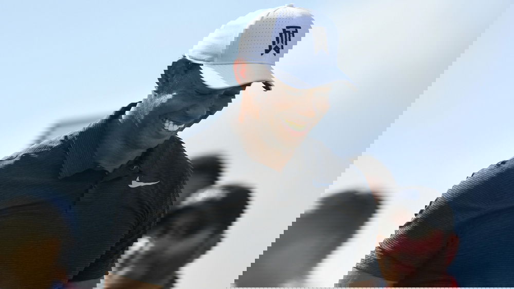 WATCH: Tiger Woods CBA to play from rough, kicks ball into fairway!