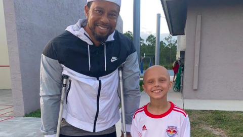 Tiger Woods takes picture with young cancer patient Luna Perrone