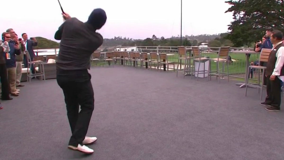 WATCH: NFL legend Tony Romo plays SHOT OF YEAR from hospitality tent!