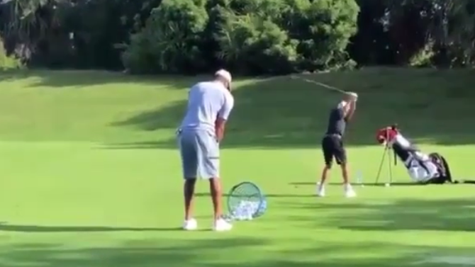 Social media reacts to video of Tiger Woods and son Charlie on the range!