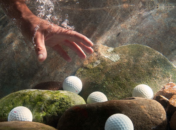 college golfer drops ball in hazard dives in to find it