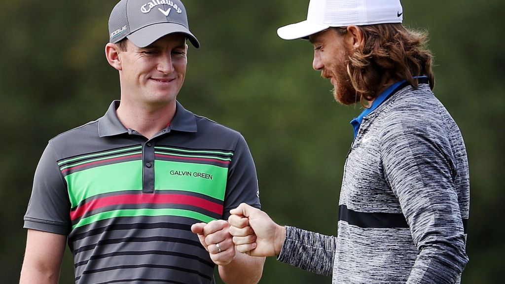 Tommy Fleetwood gives Chris Paisley a kiss after final-hole eagle