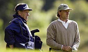 Pete Coleman on the bag of Bernhard Langer