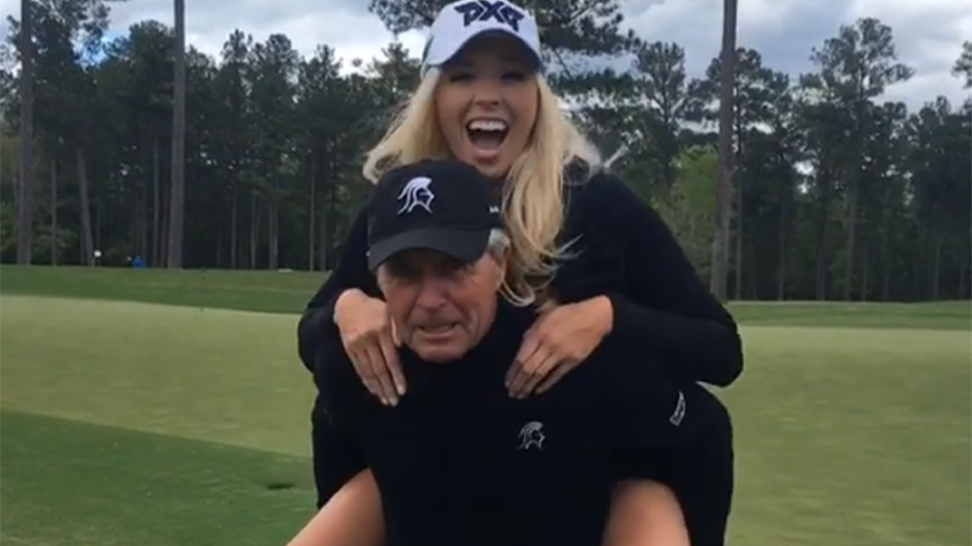 Gary Player does squats and chats up golf beauty Elise Lobb