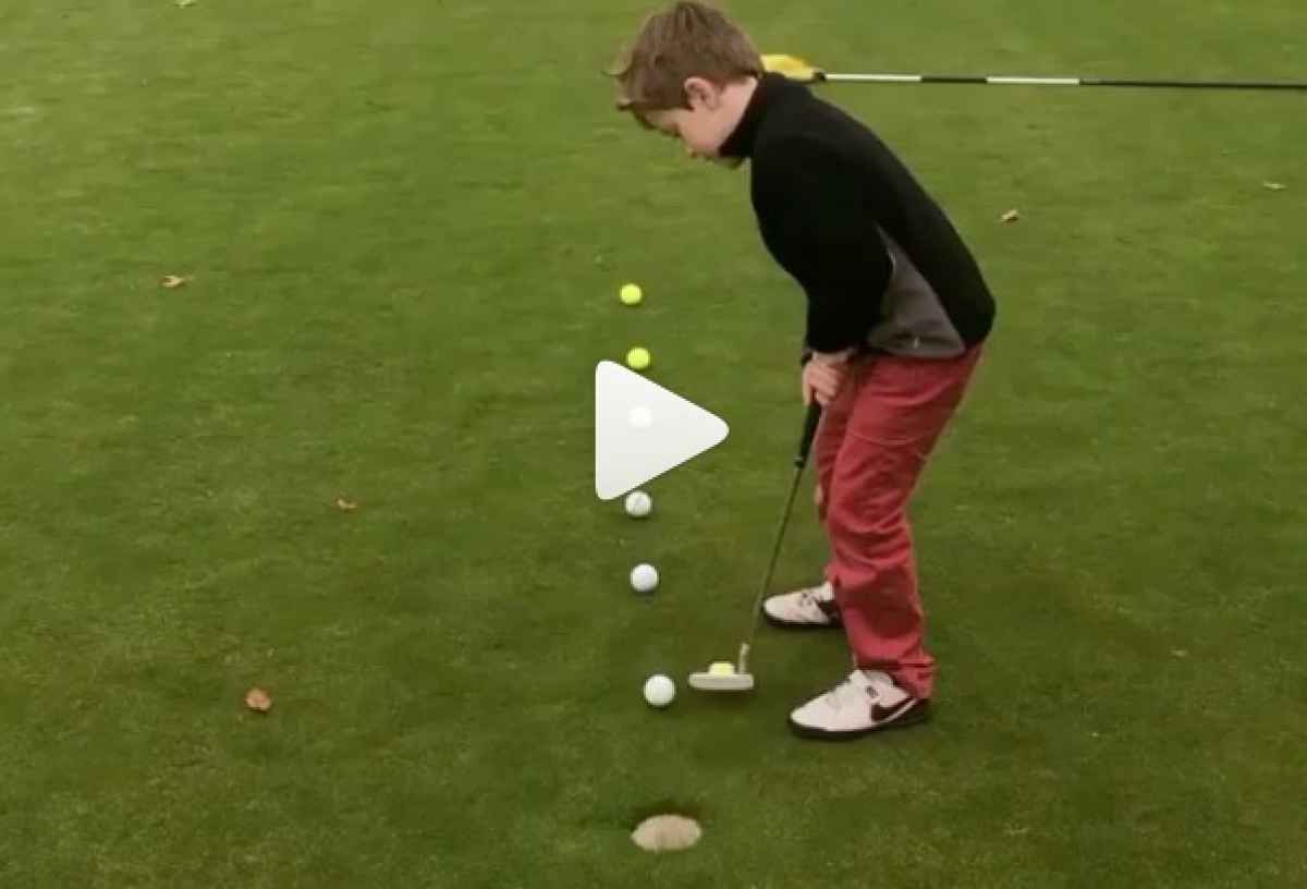 little lad shows off golf skills in cool putting drill