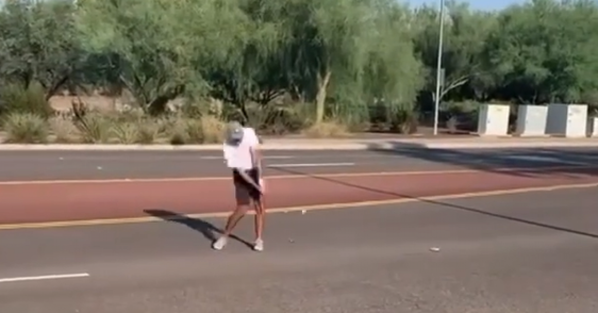 Golfer hits incredible shot OFF THE ROAD but surely it&#039;s OOB?!