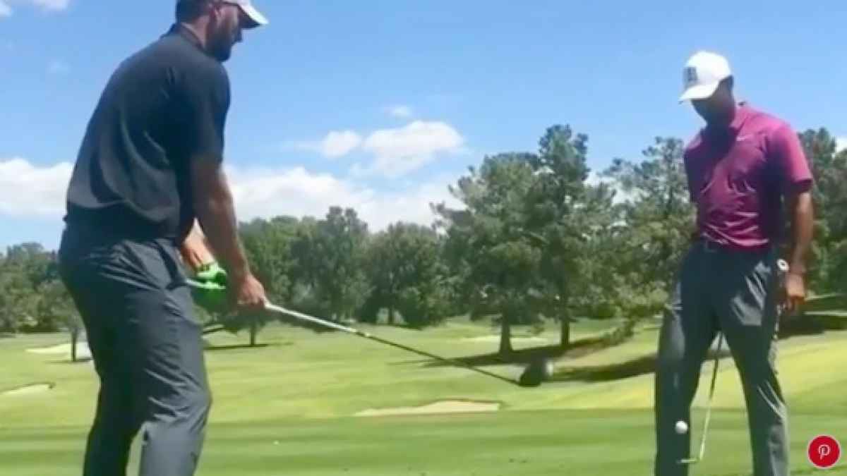 Tiger Woods and trick shot artist combine for awesome golf shot!