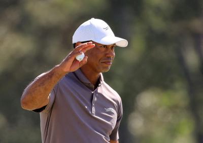 Tiger Woods joins Tyrrell Hatton on day three