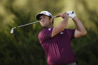Jon Rahm fishes for his glove OUT A BIN during CJ Cup opening round
