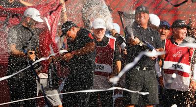 LIV Golf team champion Pat Perez receives congratulations from PGA Tour stars