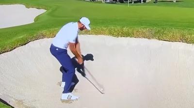 Dustin Johnson has a SHOCKER in the sand: "Has he got somewhere else to be?"