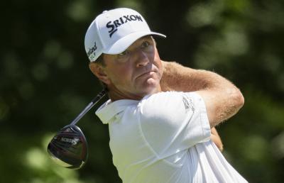Lucas Glover bounces ball off POLICE CART down 18 en route to fifth PGA Tour win