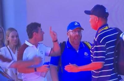 Rory McIlroy FUMING with caddie in car park after controversy at Ryder Cup
