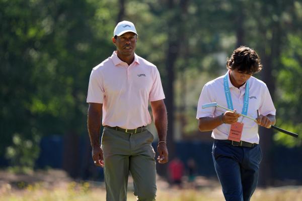 Tiger with his son Charlie at the US Open