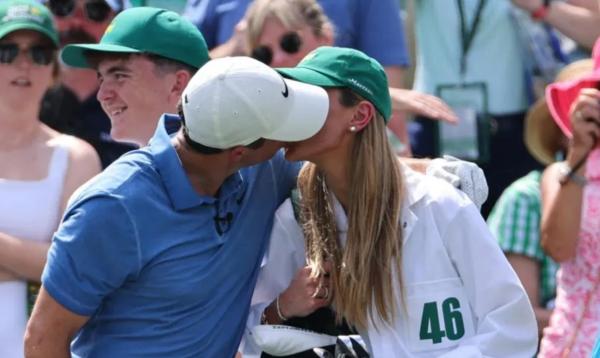 Rory McIlroy kisses his wife Erica 