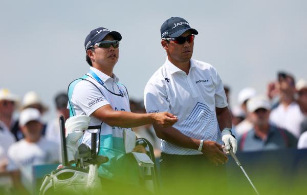 Hideki Matsuyama with caddie Shota Hayafuji