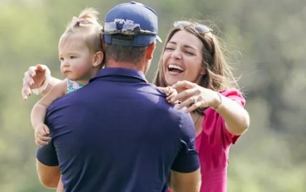 Corey Conners with wife Malory and their child