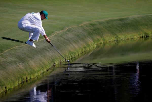 Arsenal legend Paul Merson finds the water at The Masters