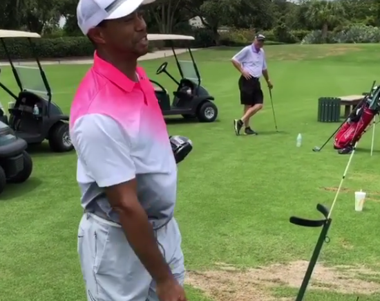 Watch: Tiger and JT give club twirl lessons