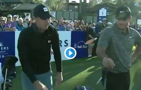 Spieth and Reed hug