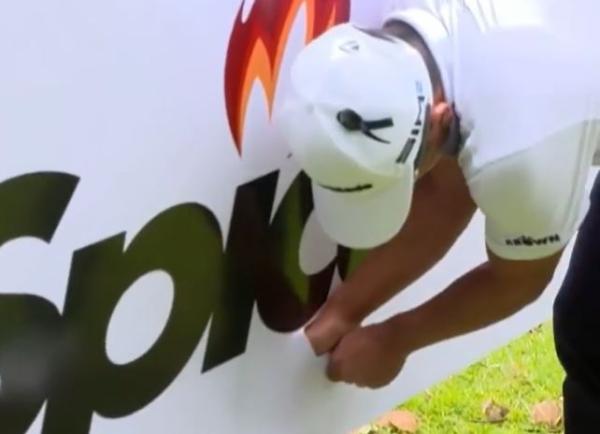 European Tour star gets golf ball stuck in sponsor sign, but what's the ruling?
