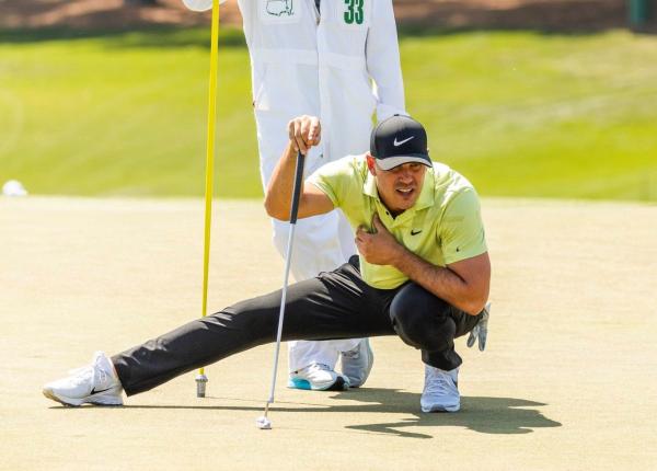 Brooks Koepka fighting through the pain with "funny" way of bending down