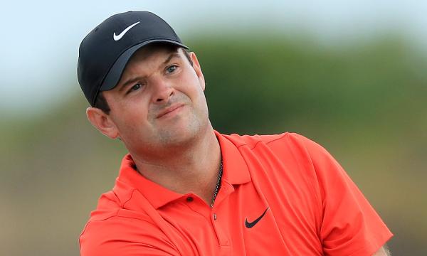 Patrick Reed takes the lead while Tiger Woods shines in the Bahamas