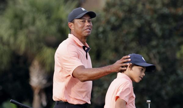 Tiger Woods goes all-in caddying for Charlie after latest swing clip goes viral 