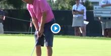 Tiger Woods' playing partner putts using his wedge