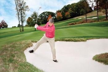 How to hit a downhill bunker shot