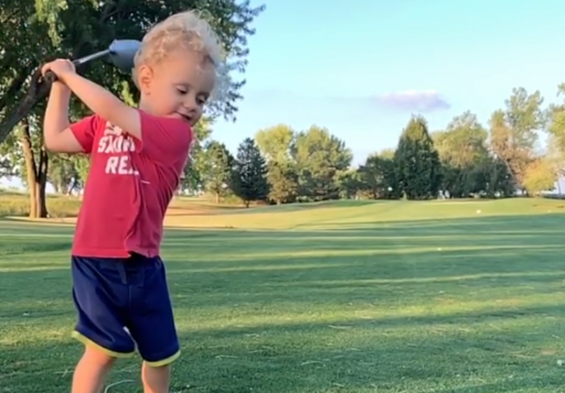 Little kid attempts epic John Daly drive, ends up on the floor!