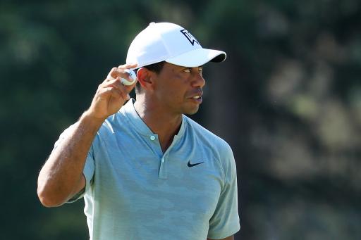 Tiger brings back old putter, shoots 62 to tie BMW lead with Rory