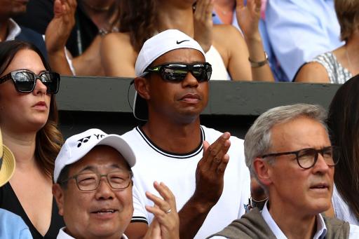 Woods expecting call from Serena Williams after Open near miss