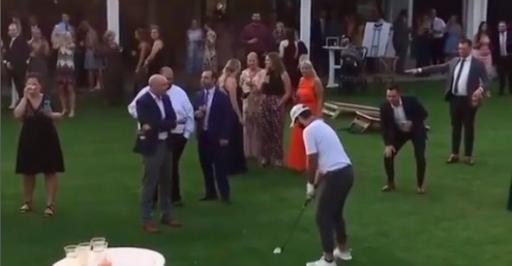 WATCH: Golfer plays his shot in front of wedding party!